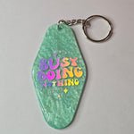 Retro Hotel Keychain - Busy Doing Nothing